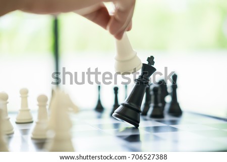 Business Strategic Formation in the chess game king is checkmated game over. Royalty-Free Stock Photo #706527388