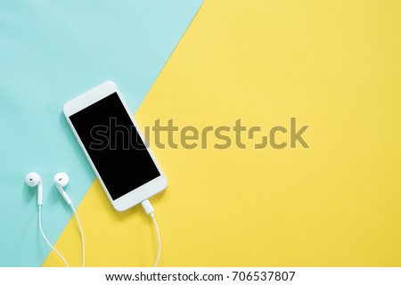 Smartphone on colorful background with copy space.modern and minimal style Royalty-Free Stock Photo #706537807
