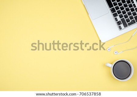 Yellow office desk table with computer. Top view with copy space