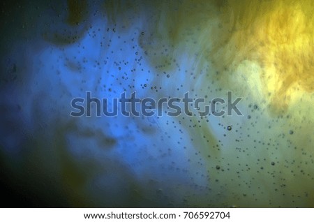 Watercolor paint dissolves in water, backlighting from different directions, large magnification, bokeh, Colored abstractions 