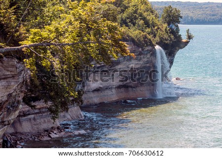 Spray Falls cascades over Pictured Rocks National Lakeshore and empties into Lake Superior, in the Upper Peninsula of Michigan