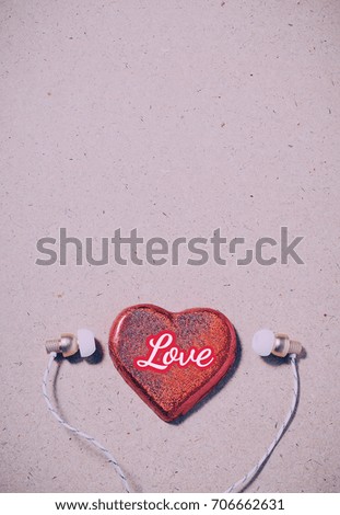 Heart-shaped chocolate and headphone 