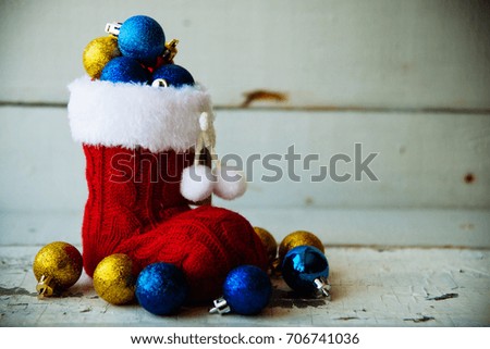 Christmas holiday background with Santa boots and decorations. new year 2017 background