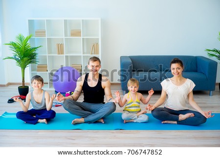 Family doing yoga together
