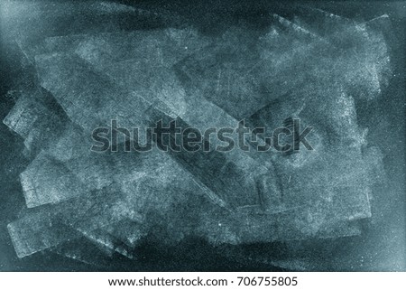 Closeup of blue chalkboard background
