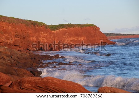 Classic east coast picture of the land and sea. Early summer morning in August down at the ocean on Prince Edward Island, two-thousand and seventeen.