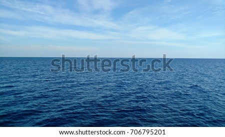 Dark blue sea and light blue sky.
 Royalty-Free Stock Photo #706795201