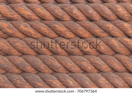 Coiled Brown Maritime Rope.  Nautical sailing line in a vertical coil.