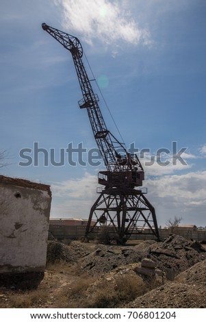 Rusty abandoned port crane in former Aral harbor, Kazakhstan
