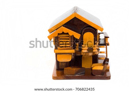 Mini replica house made of wood.