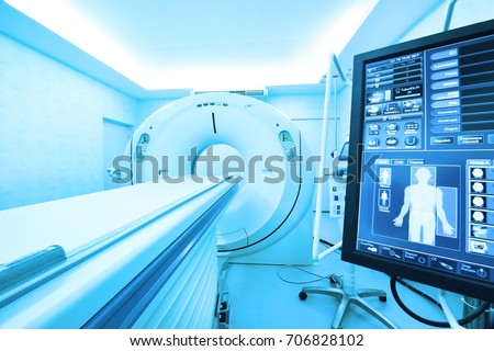 MRI scanner room take with art lighting and blue filter Royalty-Free Stock Photo #706828102
