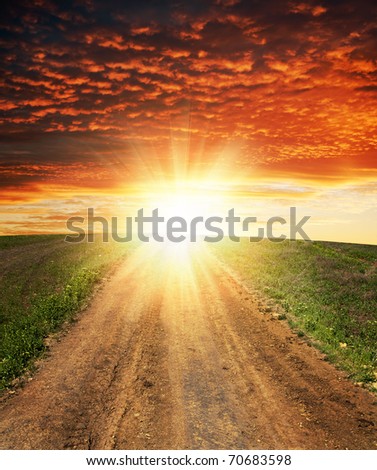 sunset over dirty road