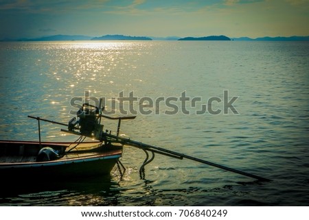 close up at back of thai longtailed boat at dawn