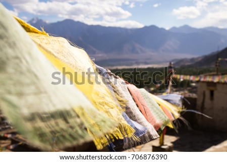 Tibetan Buddhism prayer flags (lungta) with "Om Mani Padme Hum" at Leh Palace in Leh Ladakh, Jammu and Kashmir, India
