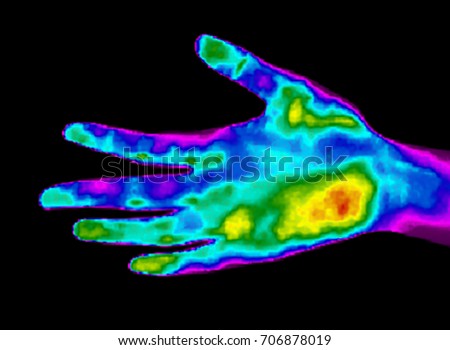 Thermographic image of Hand with different temperatures in range Royalty-Free Stock Photo #706878019