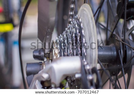 Close up Bicycle Part with Cassette Gear and Wheel.
