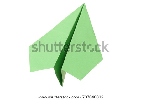 Paper airplane flying on white background 