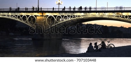 Sunset time in Seville Triana Bridge, Spain