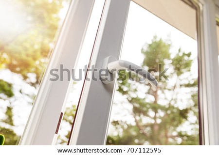 opened white plastic pvc window Royalty-Free Stock Photo #707112595