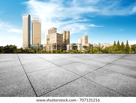cityscape and skyline of hangzhou new city in cloud sky on view from marble floor
