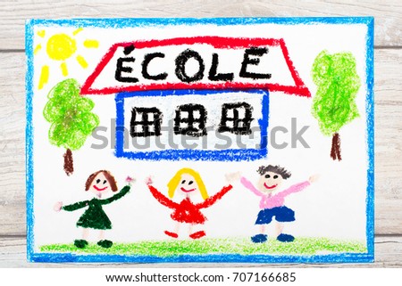 Photo of  colorful drawing: French word SCHOOL, school building and happy children. First day at school. 