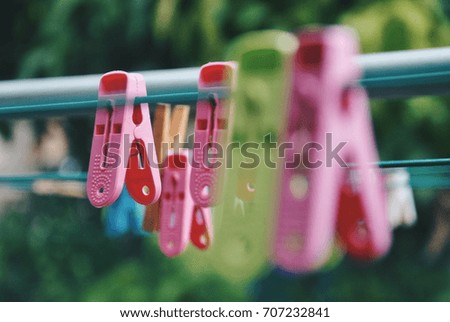 Multicoloured clothespins on the clothesline.Colourful pegs.selective focus