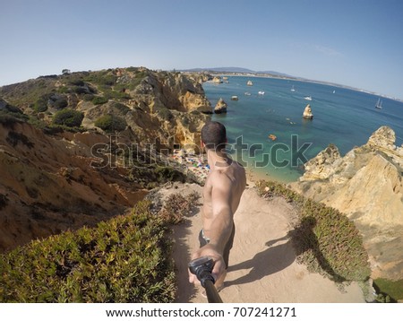 Guy Taking a Selfie in Algarve Beach, Portugal