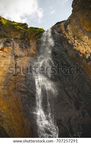Caucasian waterfall high in the mountains