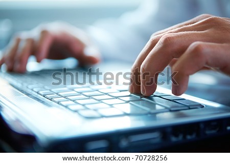 Close-up of typing male hands Royalty-Free Stock Photo #70728256