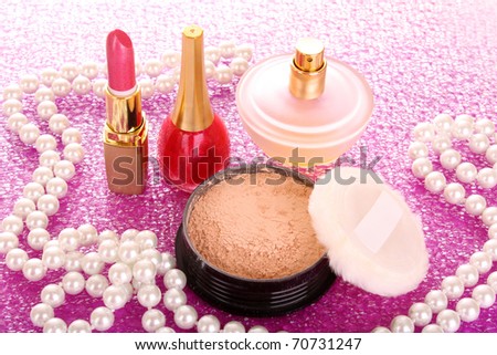 makeup powder on pink background