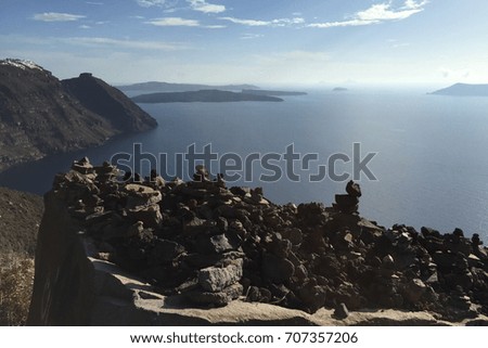 Stones stacked n Santorini Greece