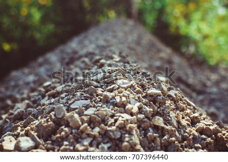 stones on a dirt road close-up of crushed stone
