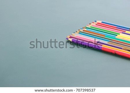 colorful pencil on writing board