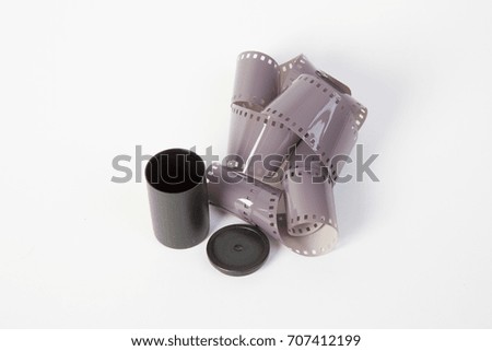 35mm film strip coil with case and cap