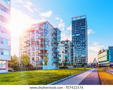 Scenic summer view of the modern architecture with business skyscrapers and apartment buildings in the Vuosaari district of Helsinki, Finland Royalty-Free Stock Photo #707422576