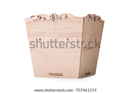 A large light brown box for small things, toys or colorful blocks, isolated on a white background. A big, opened wooden chest for playthings and dolls. Copy space.
