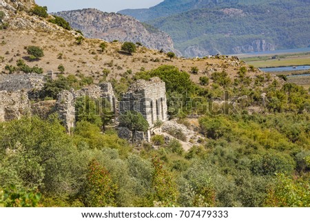 The hictory Kaunos Ancient City and background Dalyan delta. Mugla-Turkey
