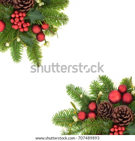 Decorative christmas background border with holly ivy, mistletoe, fir, red bauble decorations and pine cones on white.