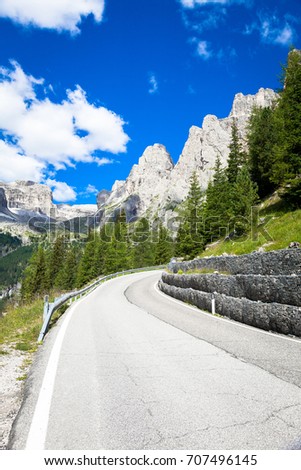 Wonderful sunny day with blue sky background; road in Dolomiti Region, North-East Italy