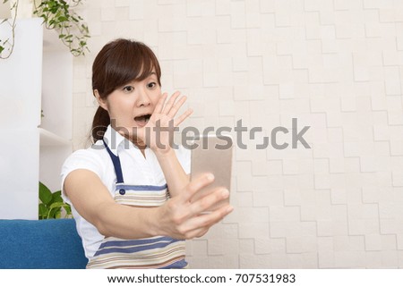 Surprised Asian woman