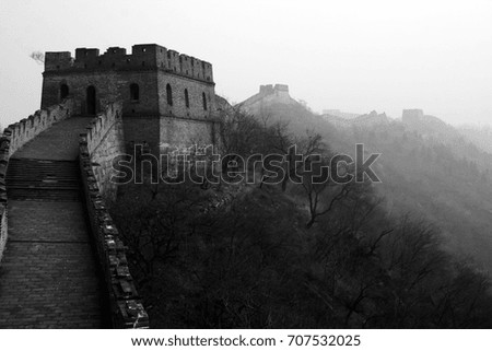 Chinese the Mutianyu Great Wall in fog and haze.