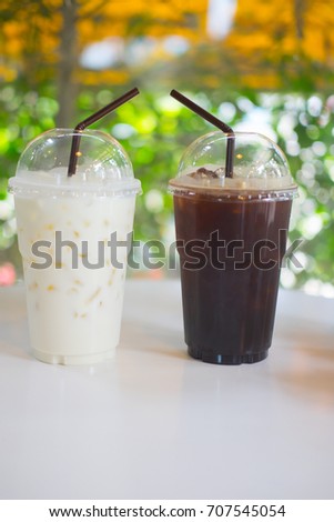 Two cup of iced americano and iced milk