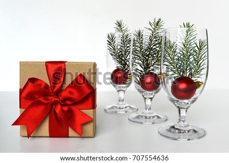 Christmas gift and Christmas decoration. Christmas balls arranged in wine glasses	