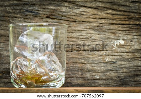 ice  in glass on old backgrounds