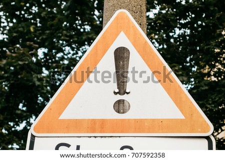 old attention sign with green background