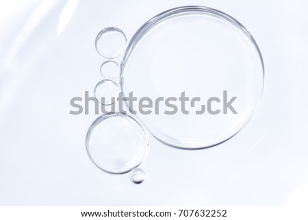 big and small bubbles in white background Royalty-Free Stock Photo #707632252