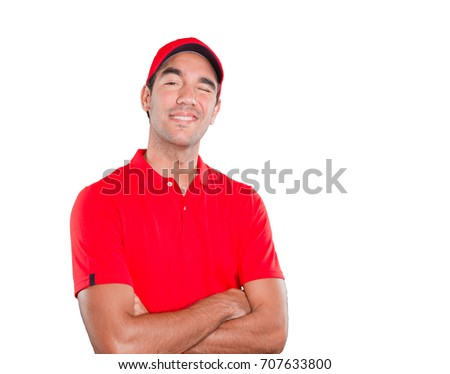 Confident delivery man winking an eye