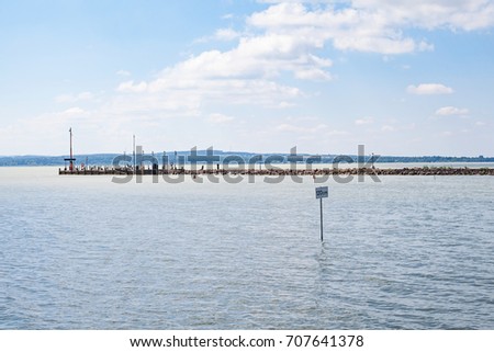 Scenic picture of Lake Balaton waterfront and a 120 m sign, Hungary