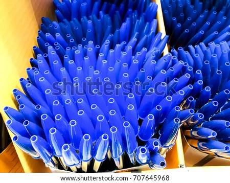 Blue ballpoint pens in pencil case Royalty-Free Stock Photo #707645968