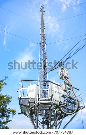 Telephone tower towers.